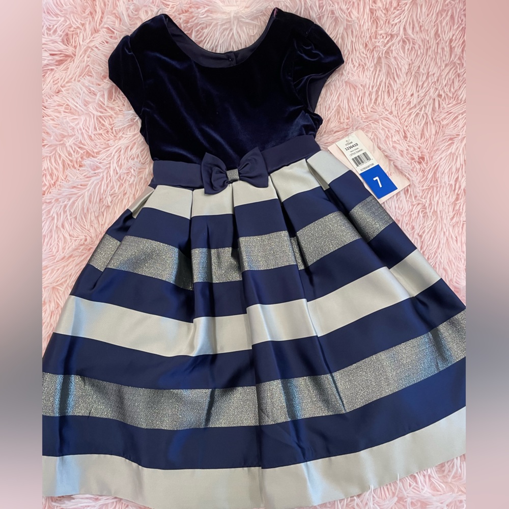 Beautiful blue Jona Michelle dress. Never worn; with tags. Size 7